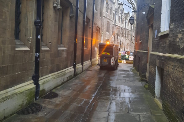 Vehicle cleaning a street
