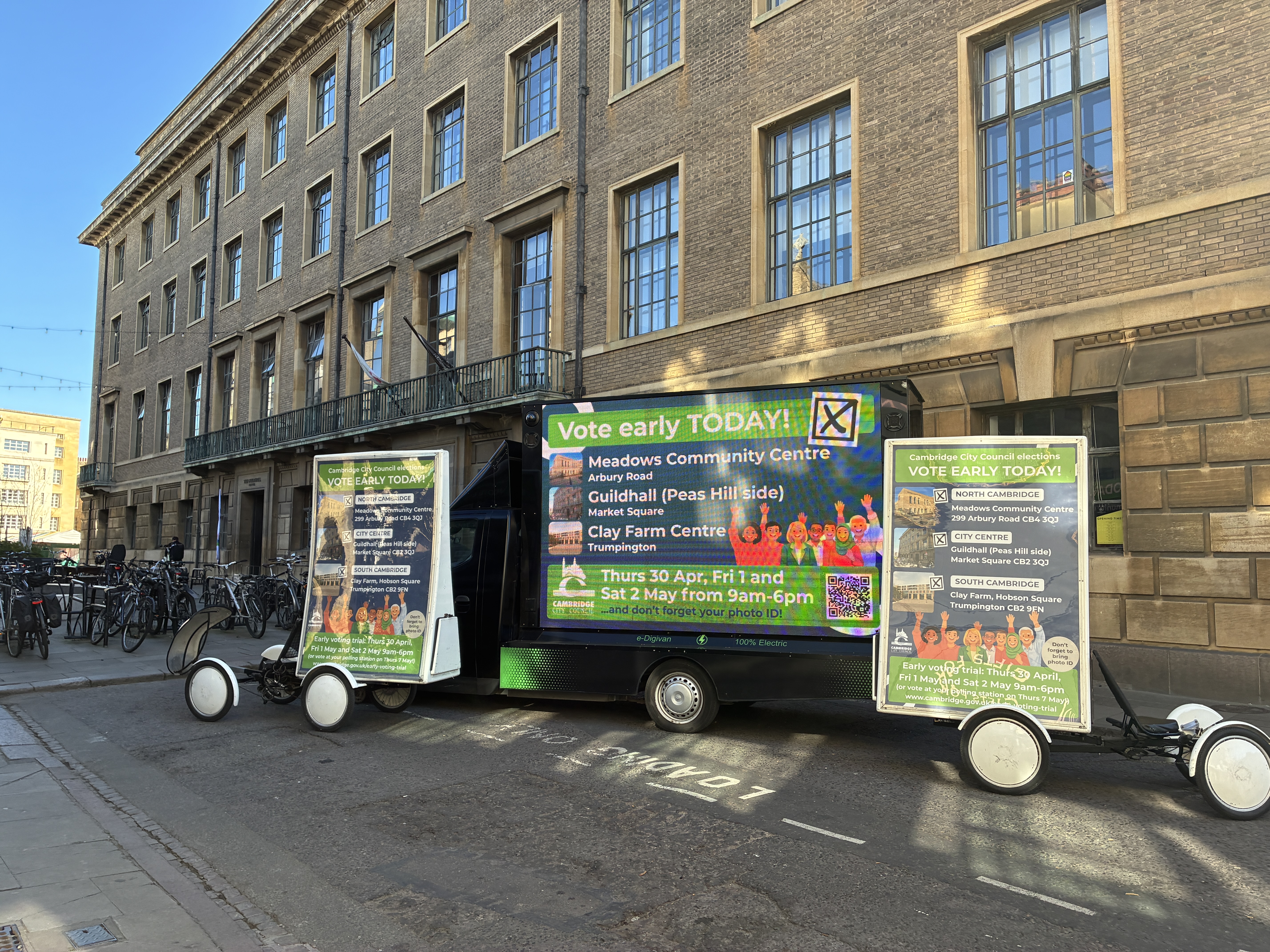 Promotional vehicles outside the Guildhall for this year's early voting trial