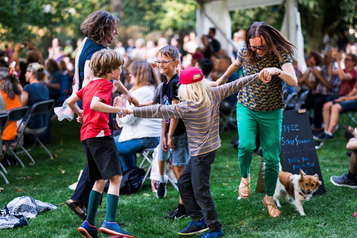Children playing at a Music in the Parks event