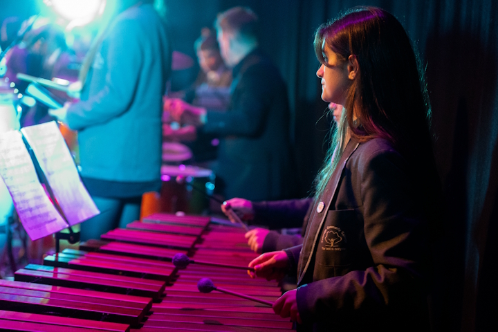 Studnet playing a xylophone